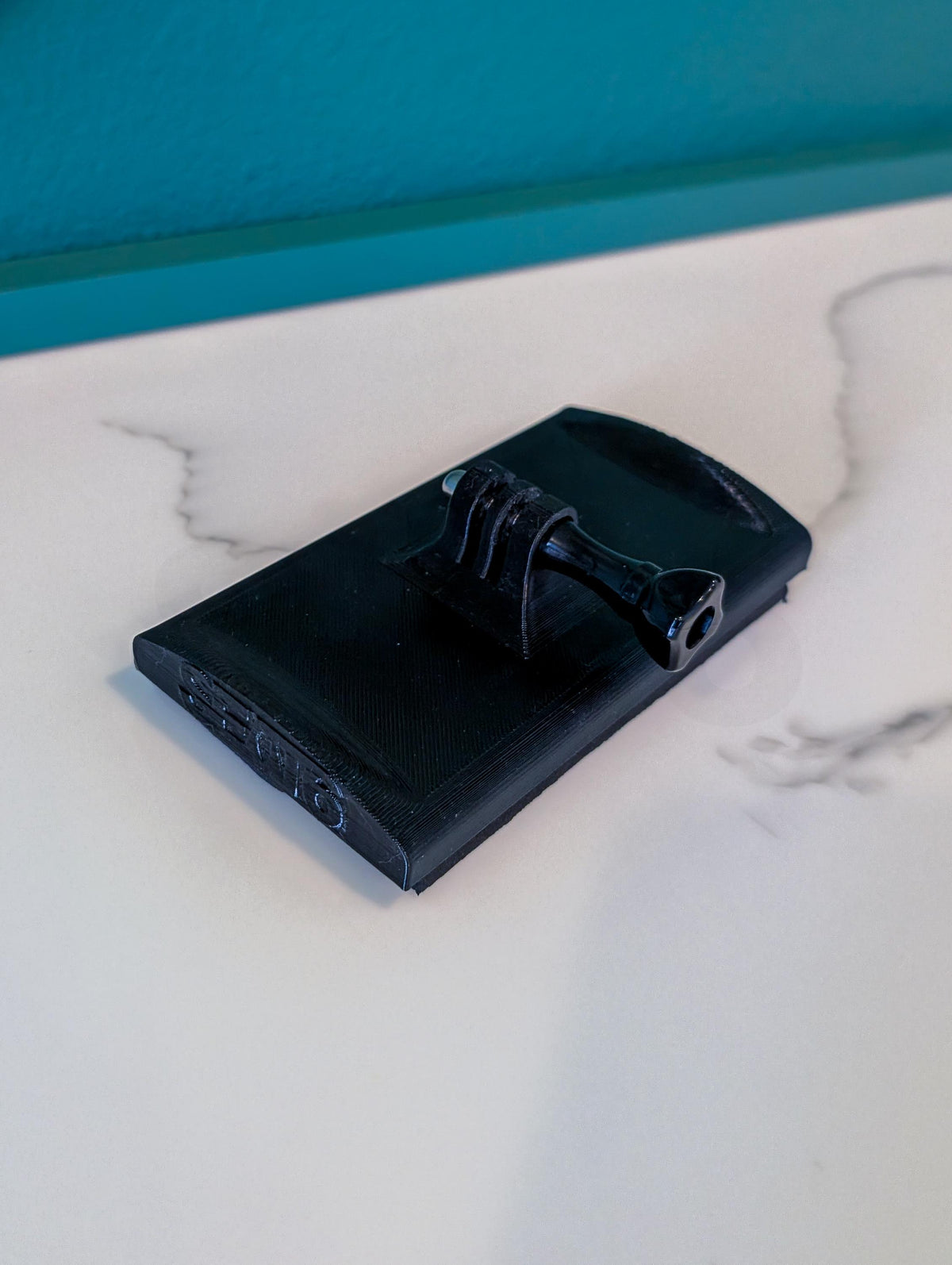 Rectangular Iako Camera Mount on a rectangular wood iako